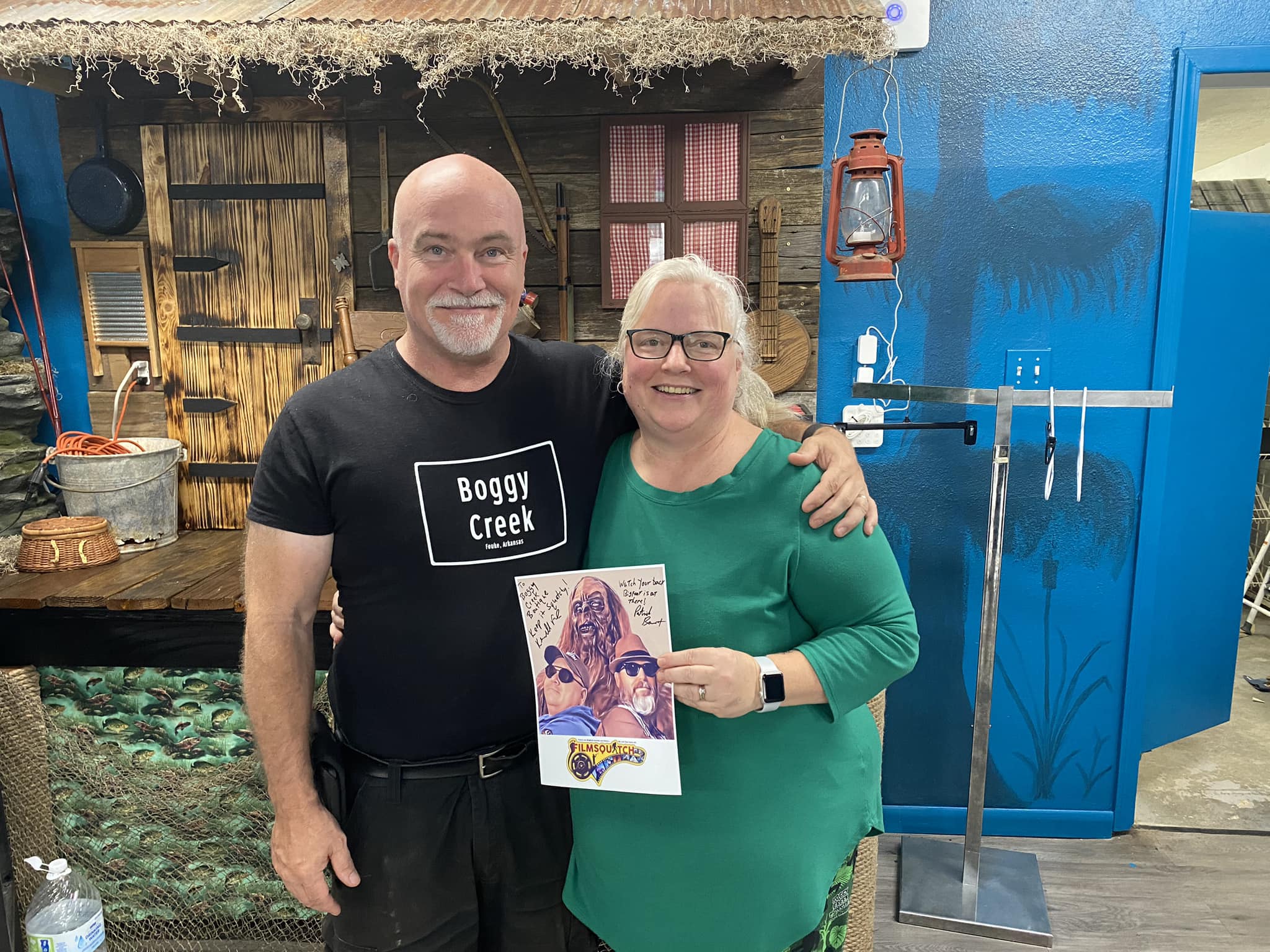 The owners of the Boggy Creek Boutique in Fouke, Arkansas who asked for an autographed photo to hang on the wall in their store.